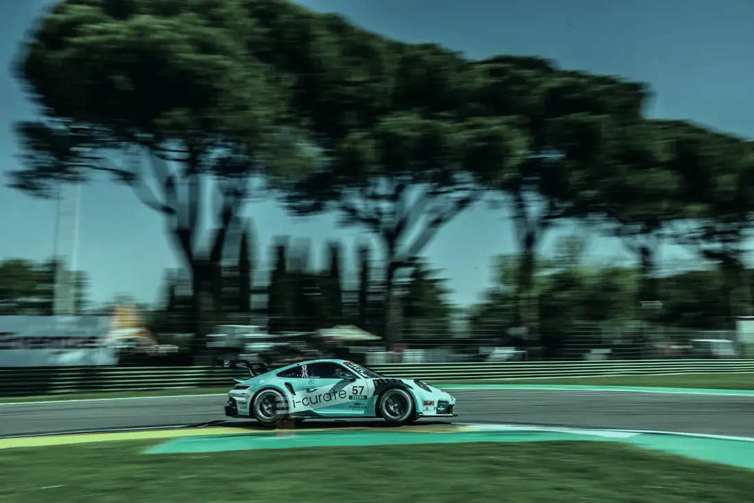 Gus's car at speed at Imola
